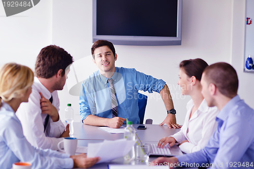Image of business people in a meeting at office