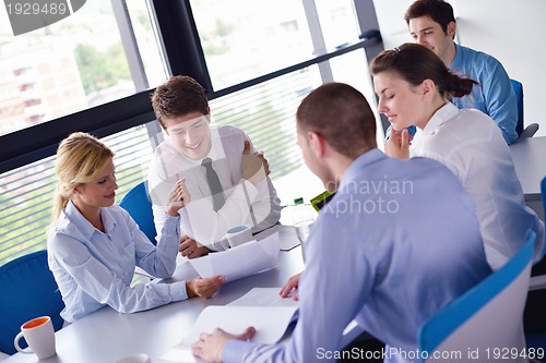 Image of business people in a meeting at office