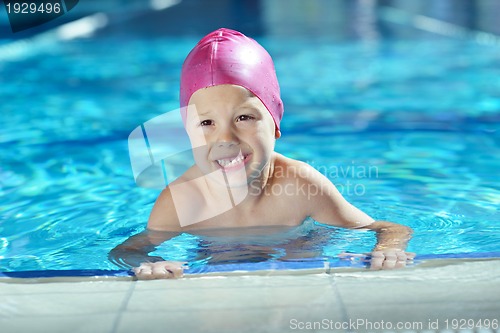 Image of happy child on swimming pool