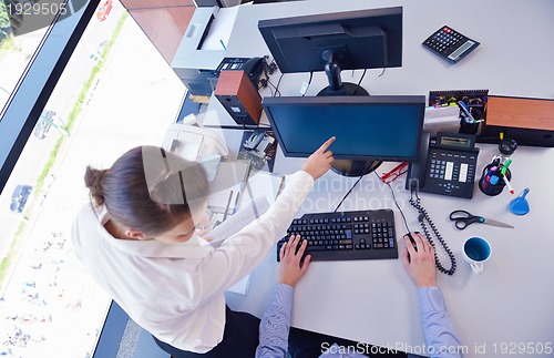 Image of business people in a meeting at office