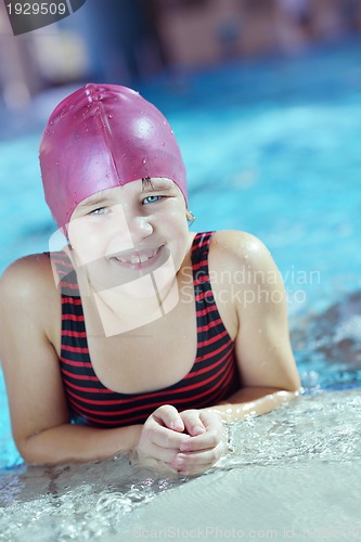 Image of happy child on swimming pool