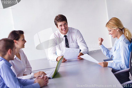 Image of business people in a meeting at office