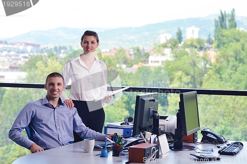Image of business people in a meeting at office