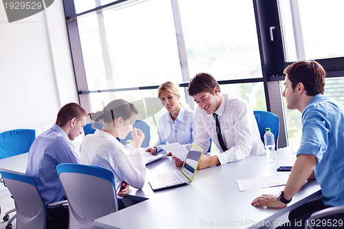 Image of business people in a meeting at office