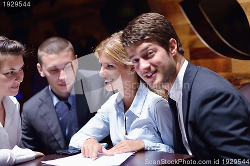 Image of business people in a meeting at office