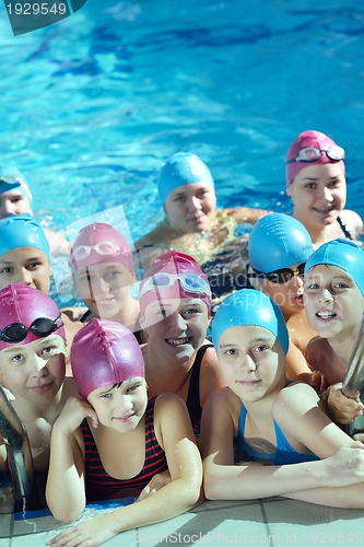 Image of happy children group  at swimming pool
