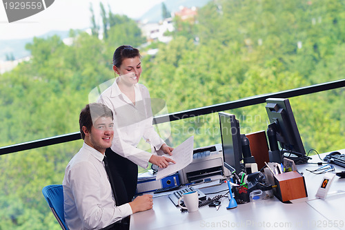 Image of business people in a meeting at office