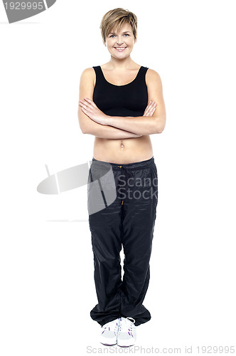 Image of Full length portrait of fit lady in gym wear