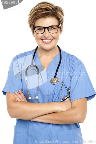 Image of Profile shot of a cheerful middle aged female doctor