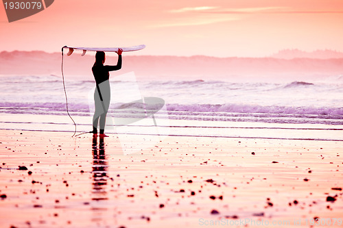 Image of Female surfer