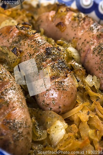 Image of Roasted sausages with sauerkraut - polish dish