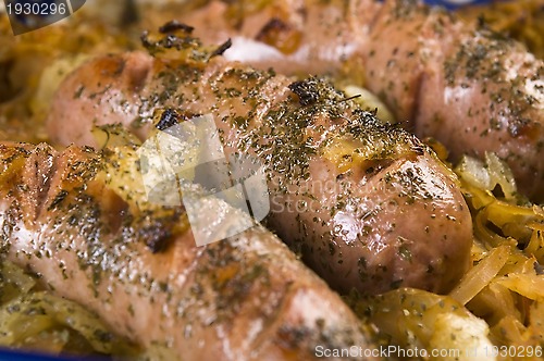 Image of Roasted sausages with sauerkraut - polish dish