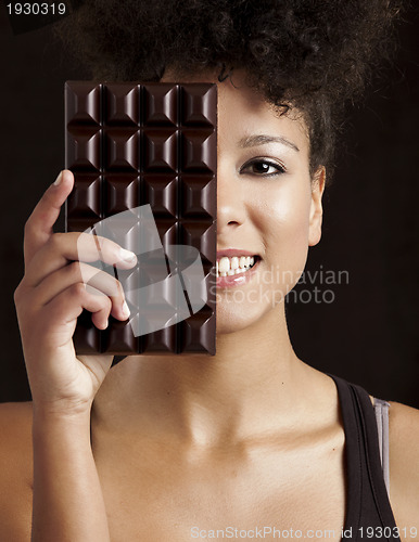 Image of Woman with a chocolate bar