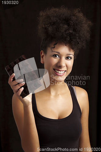 Image of Woman with a chocolate bar