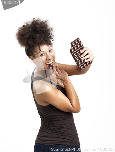 Image of Woman eating chcolate