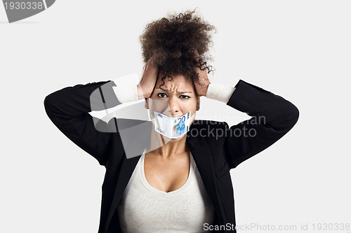 Image of Covering mouth with a euro banknote