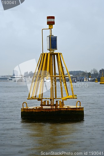 Image of yellow  bell buoy