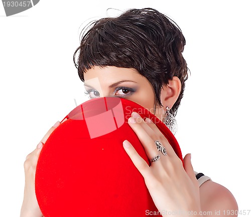 Image of young beautiful woman with red hat
