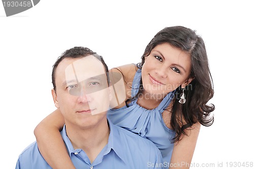 Image of Portrait of loving couple hugging man from behind 