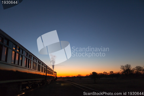 Image of Train into sunset