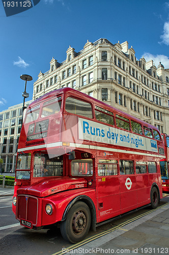 Image of LONDON, SEP 28: Red double decker bus speeds up on the streets o