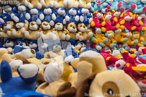 Image of Stuffed animals inside a vending machine