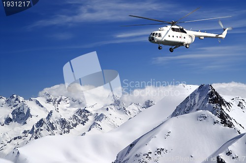 Image of Helicopter in winter mountains