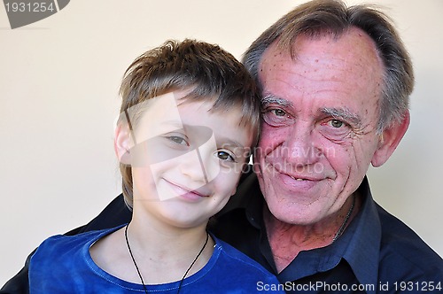 Image of portrait of smiling father and  son