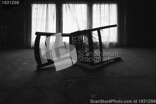 Image of a chair in the attic