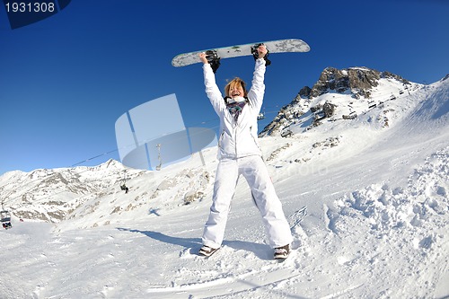 Image of skiing on fresh snow at winter season at beautiful sunny day