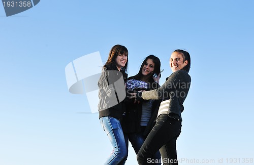 Image of group of teens have fun outdoor