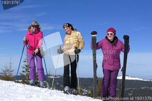 Image of winter season fun with group of girls