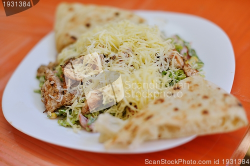 Image of woman eat salad