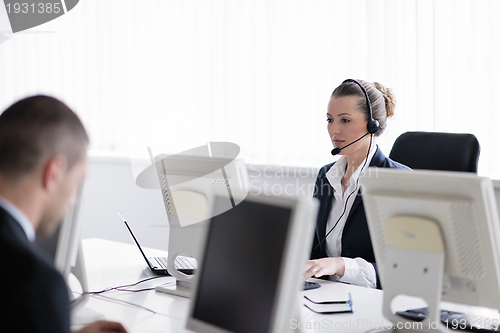 Image of business people group working in customer and help desk office