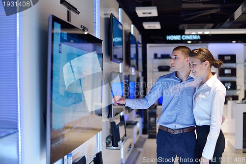 Image of people buy  in consumer electronics store