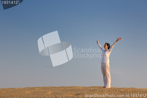Image of woman relax in desert