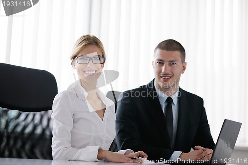Image of business people in a meeting at office