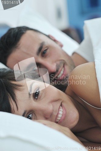 Image of young couple have good time in their bedroom