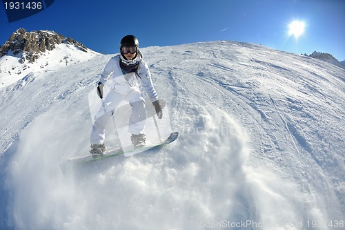 Image of skiing on fresh snow at winter season at beautiful sunny day