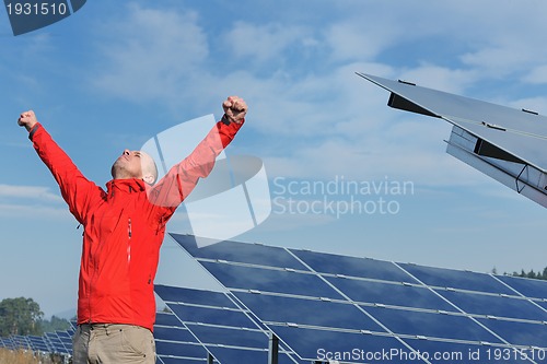 Image of Male solar panel engineer at work place