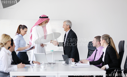 Image of Arabic business man at meeting