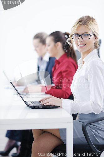 Image of business woman group with headphones