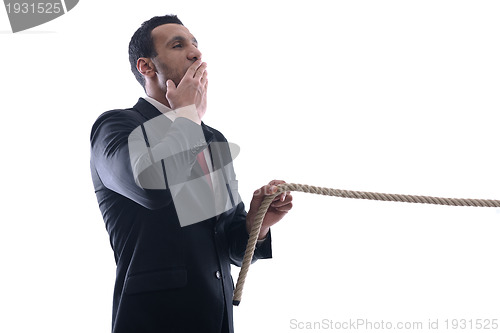 Image of business man with rope isolated on white background