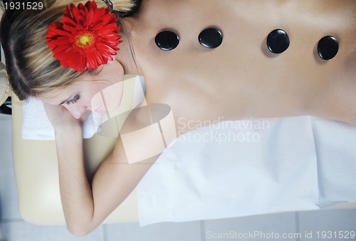 Image of Beautiful young woman in spa