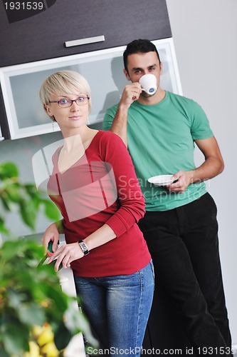 Image of young couple have fun in modern kitchen