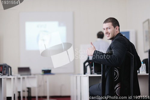Image of business man on seminar