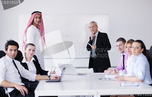 Image of Arabic business man at meeting