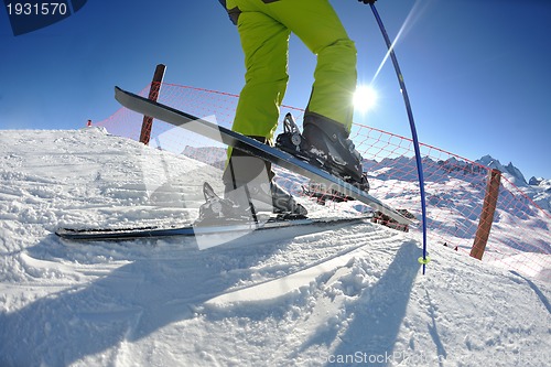 Image of skiing on fresh snow at winter season at beautiful sunny day