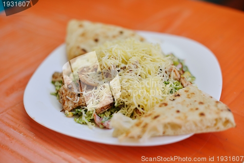 Image of woman eat salad