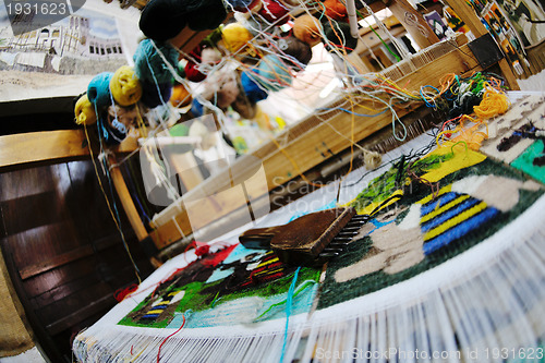 Image of traditional arabic rug production